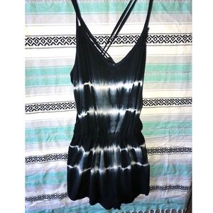 Black acid cross strap romper